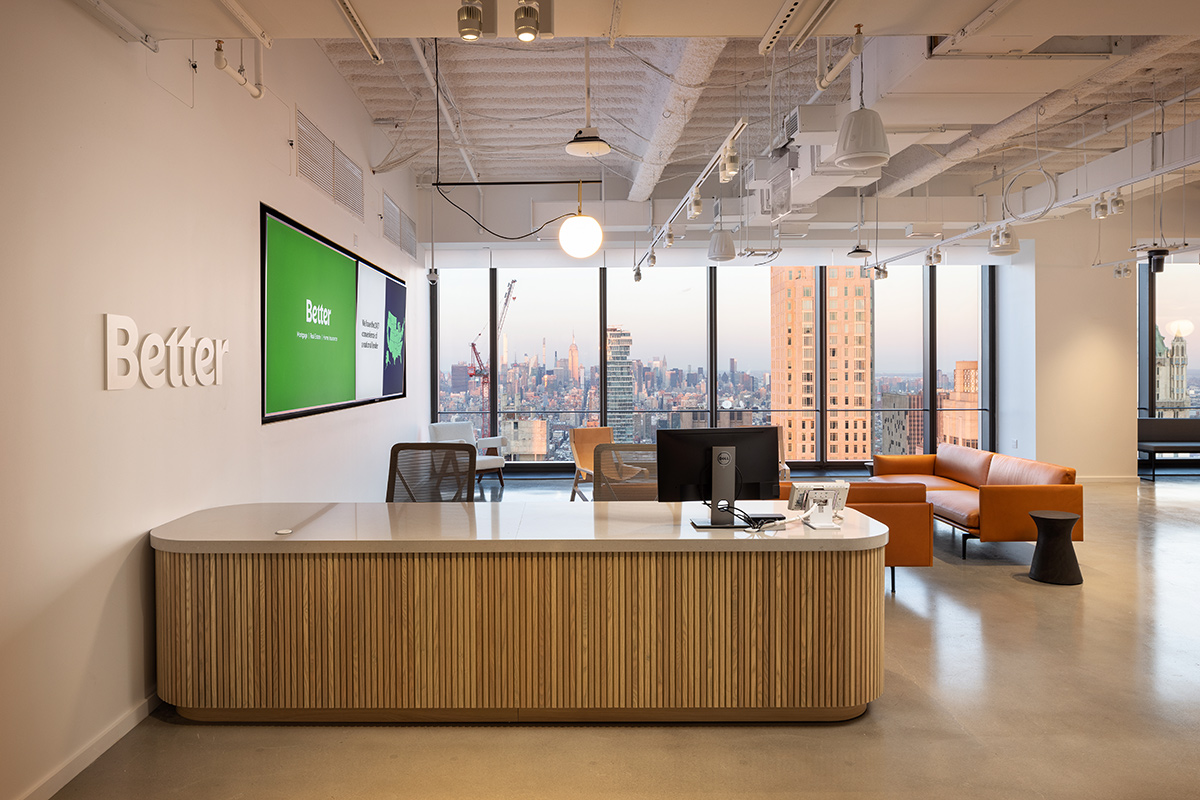 Reception area at the Better office with a city view out the window