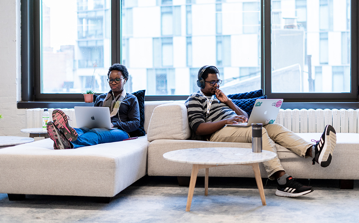 Two Flatiron team members working in the office