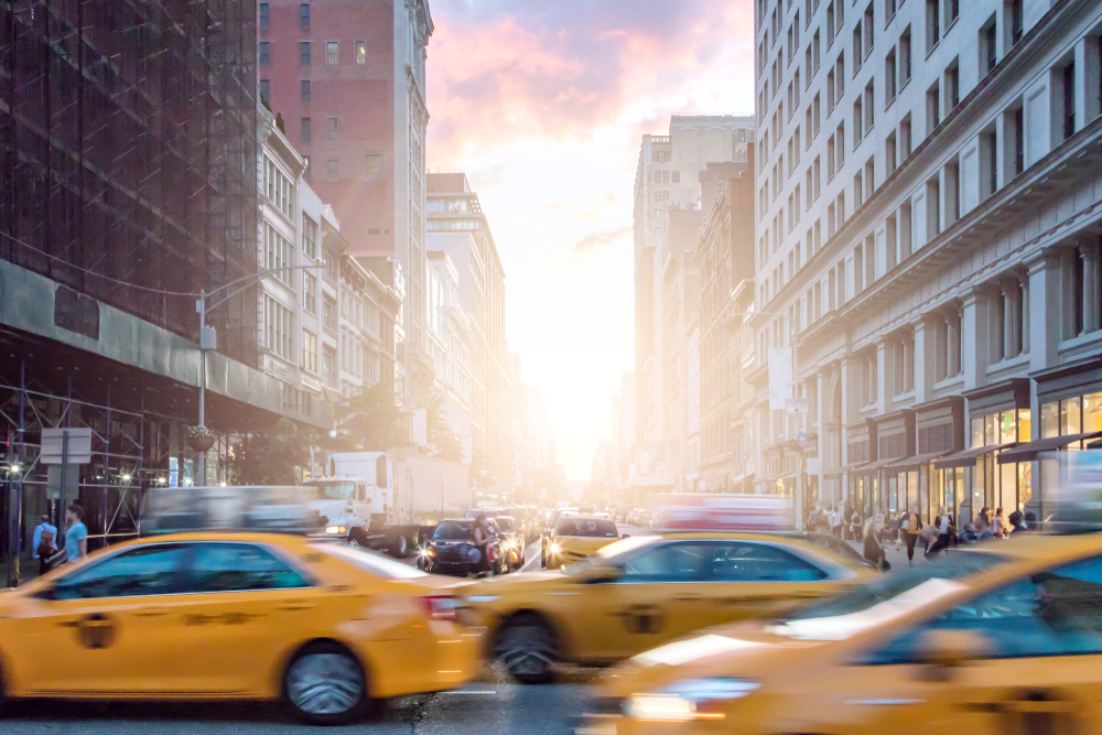 nyc taxis driving by