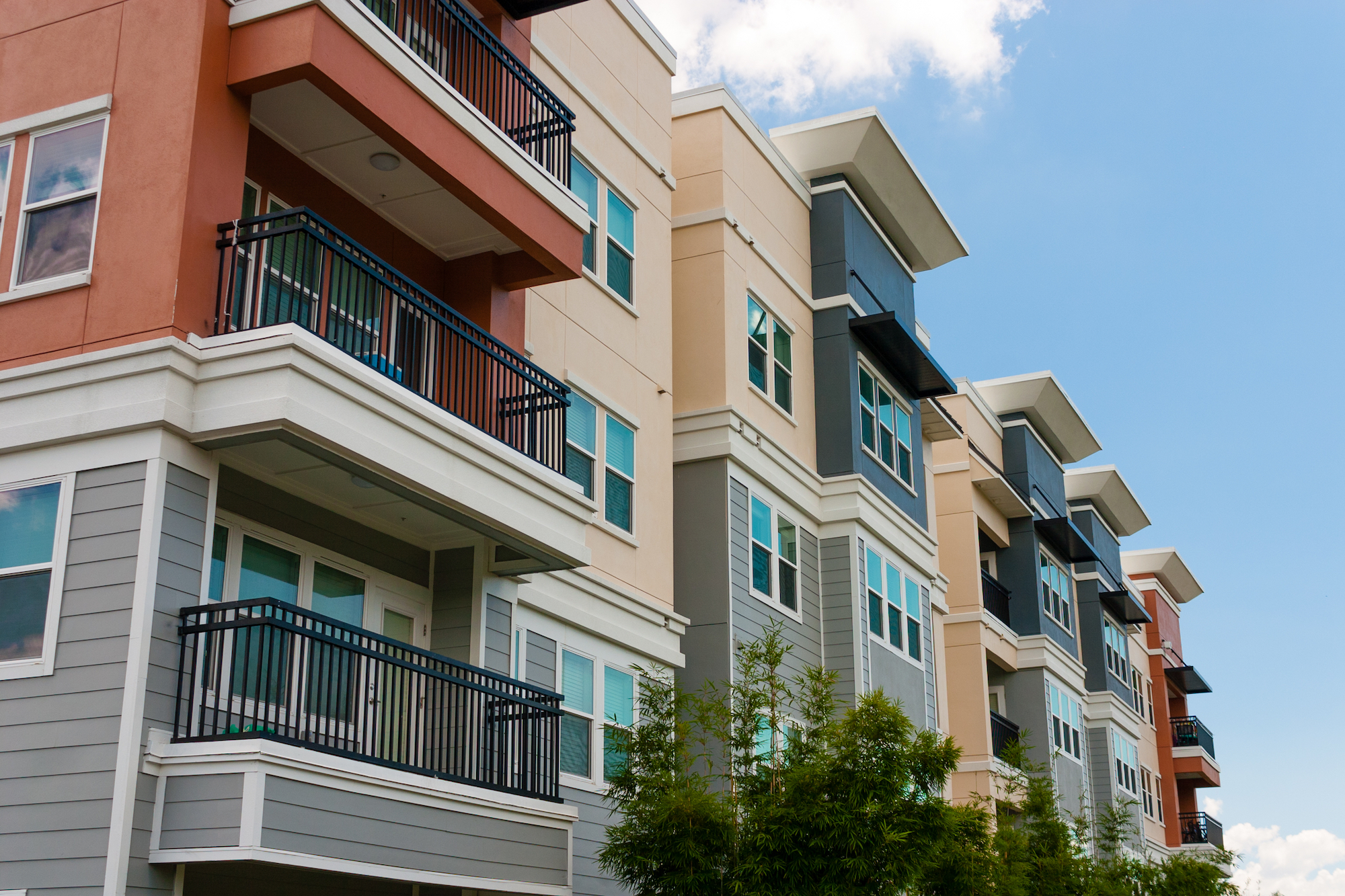 A modern apartment building is pictured.