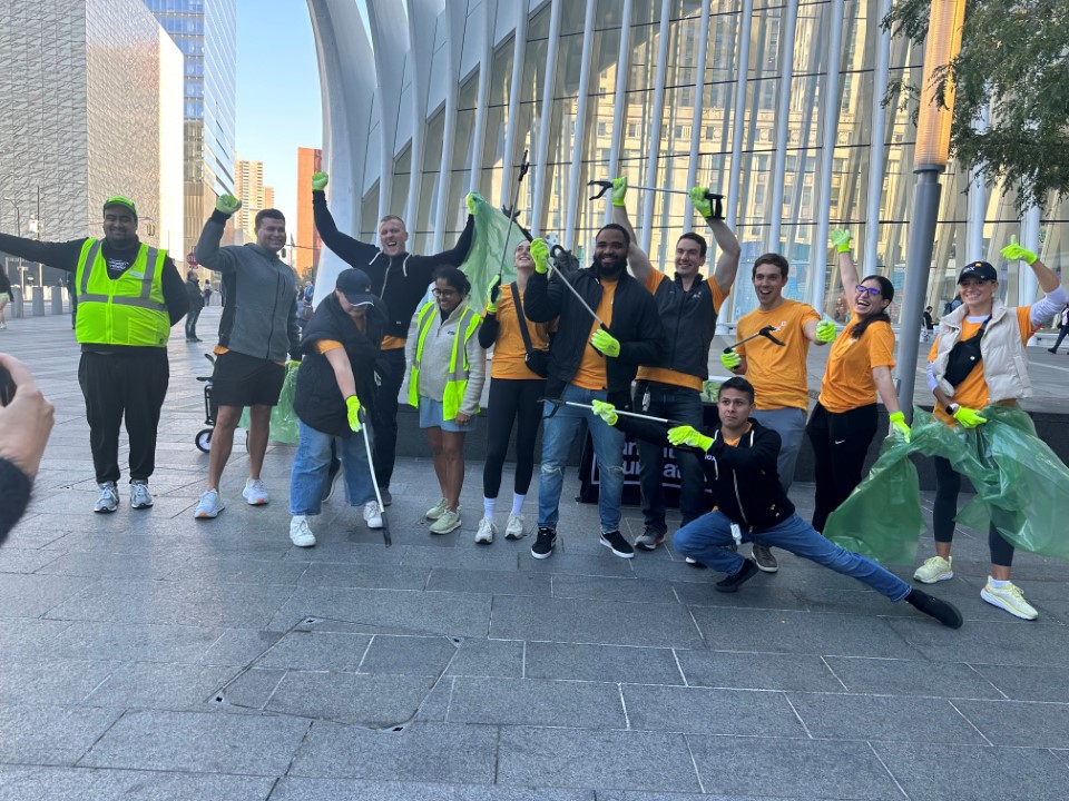 IEX team members from the employee-led Think Big, Do Go committee at a volunteer city cleanup event