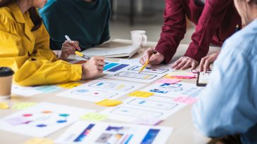 creative team going over proofs